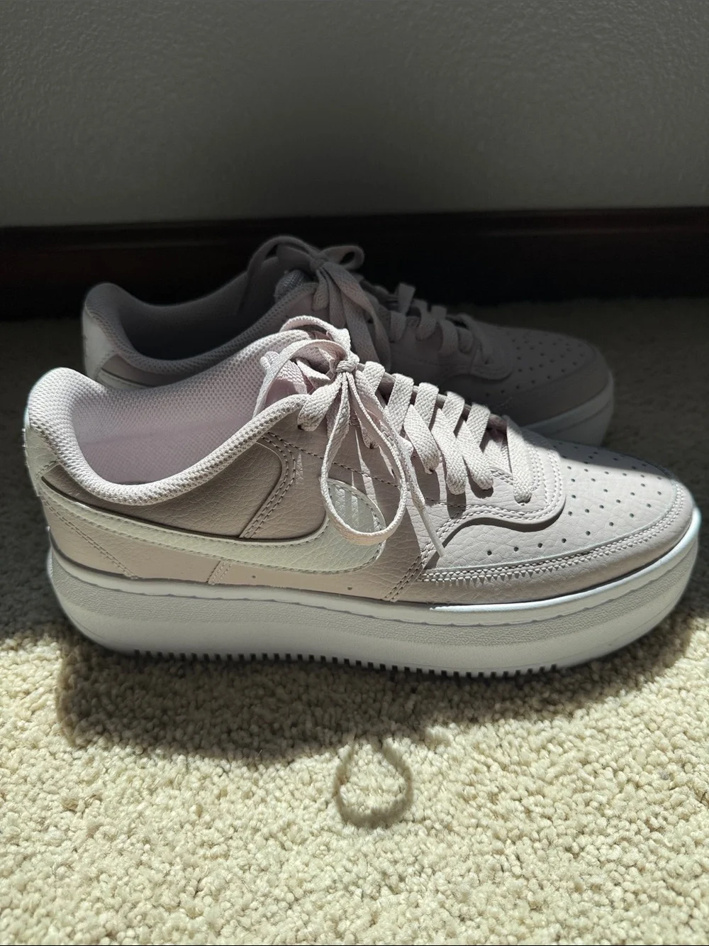 Nike Women’s Light Pink Platform Sneakers with White Swoosh